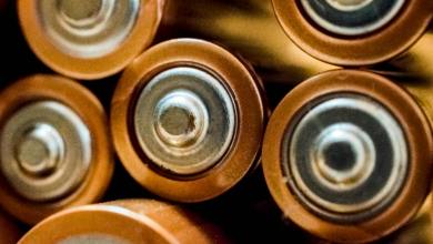 close up photo of batteries Li-ion battery demand rises, driven by EV growth; shifts to cost-effective materials like LFP, LMFP, and artificial graphite dominate market trends.