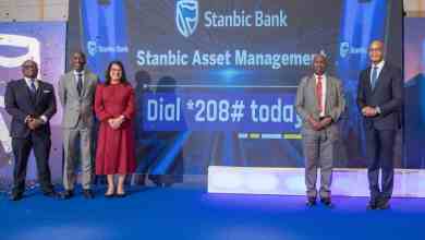 Stanbic Bank Executives and Wyckliffe Shamiah, CEO Capital Markets Authority pose of a photo during the launch of the Stanbic Money Market Fund (KES) and the Stanbic Fixed Income Fund (USD). New Stanbic Money Market Fund Promises 15.12% Annual Yield